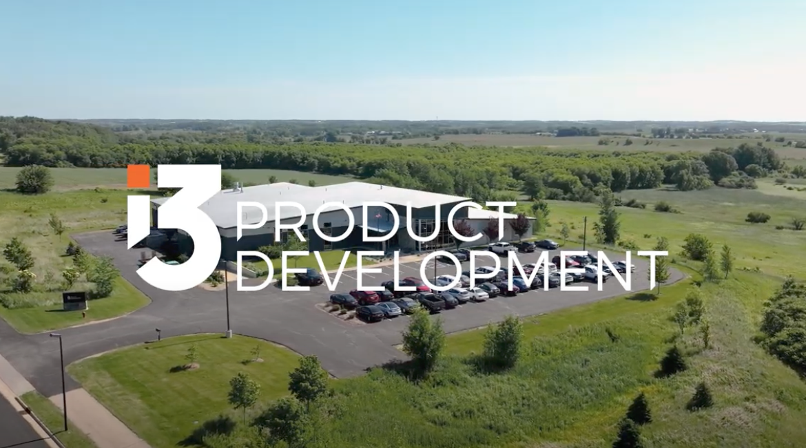 Aerial footage of i3 Product Development headquarters with logo