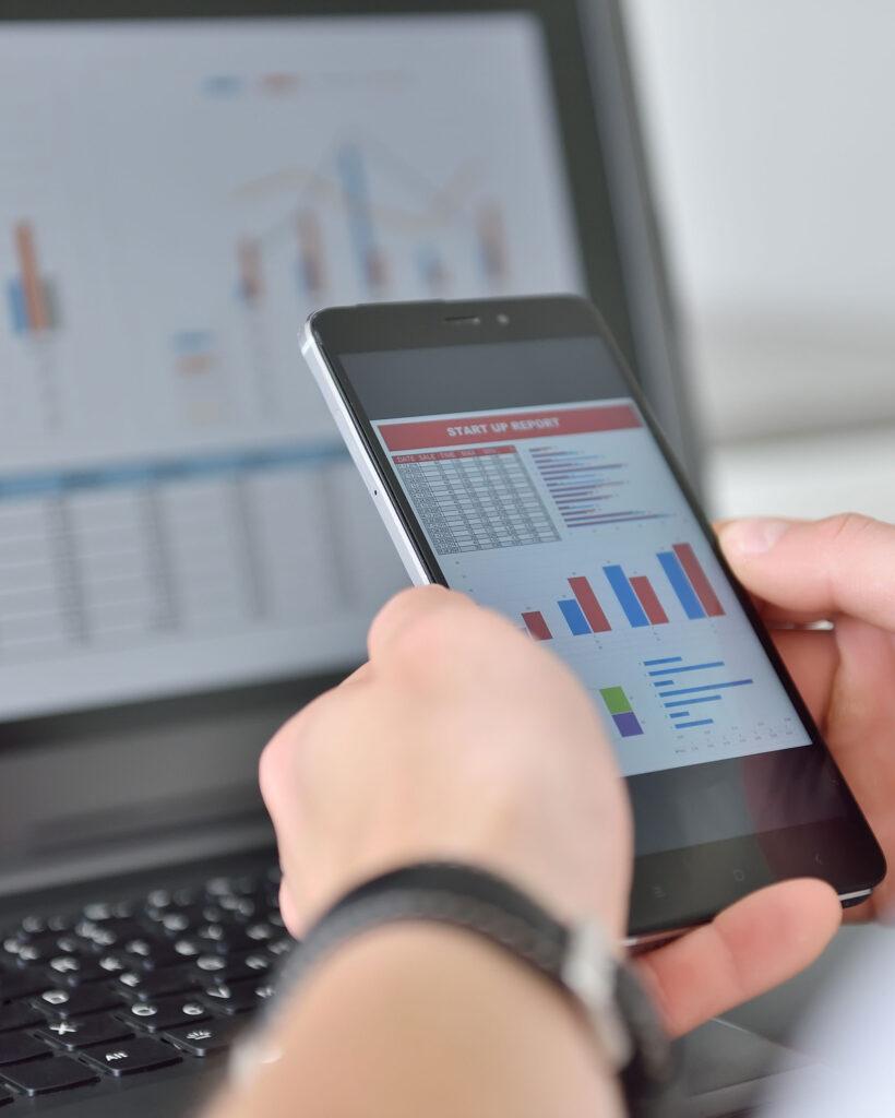 Person using a handheld analytical device